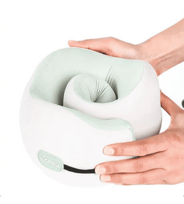 CHOOKLY foldable ergonomic memory foam travel neck pillow rolled into compact shape, demonstrating portable design with adjustable strap for comfortable airplane and travel neck support
